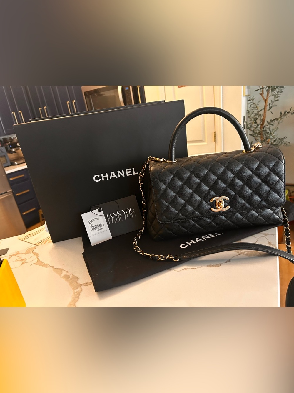 CHANEL Black Quilted Leather Satchel with Gold Chain